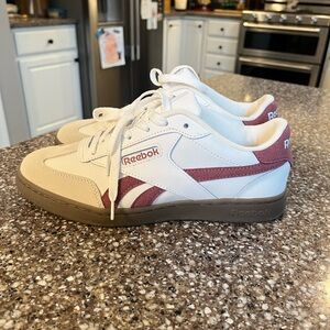 Reebok women’s Cream and Burgundy Sneakers